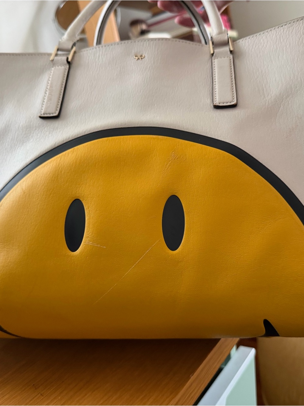 Anya Hindmarch Cream Tote with Yellow Smiley Face and Black Trim